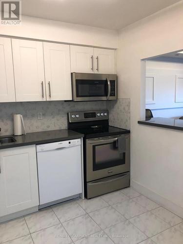 506 - 1270 Maple Crossing Boulevard, Burlington, ON - Indoor Photo Showing Kitchen