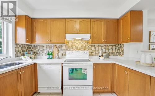 203 - 80 Acorn Place, Mississauga, ON - Indoor Photo Showing Kitchen With Double Sink