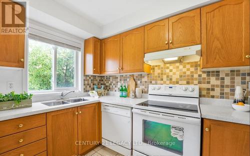 203 - 80 Acorn Place, Mississauga, ON - Indoor Photo Showing Kitchen With Double Sink