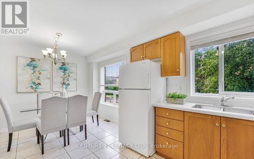 203 - 80 Acorn Place, Mississauga, ON - Indoor Photo Showing Kitchen With Double Sink