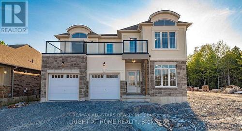 13 Spruceside Drive, Kawartha Lakes (Bobcaygeon), ON - Outdoor With Balcony With Facade