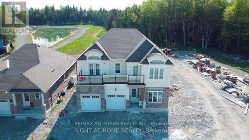 13 Spruceside Drive, Kawartha Lakes (Bobcaygeon), ON - Outdoor With Facade