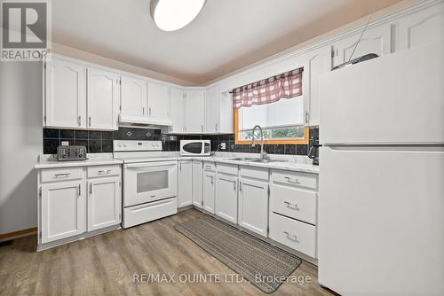 16 Harbourview Crescent, Prince Edward County (Wellington), ON - Indoor Photo Showing Kitchen With Double Sink