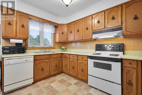 9580 Sinclair Drive, Middlesex Centre, ON - Indoor Photo Showing Kitchen With Double Sink