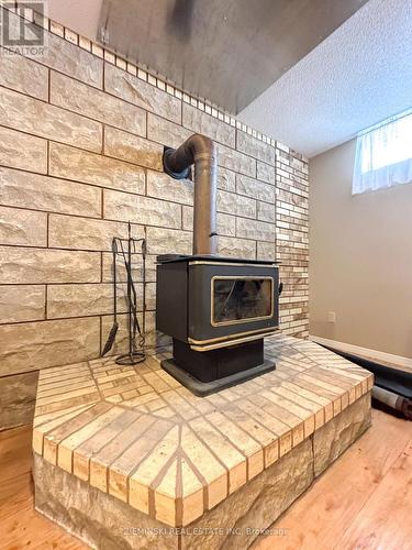 639 Majestic Street, Iroquois Falls, ON - Indoor Photo Showing Other Room With Fireplace