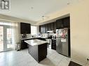 2 - 18 Cathedral High Street, Markham, ON  - Indoor Photo Showing Kitchen 