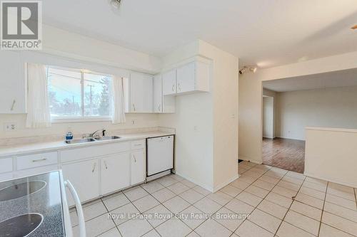 98 Glenburnie Drive, Guelph (Grange Hill East), ON - Indoor Photo Showing Kitchen With Double Sink