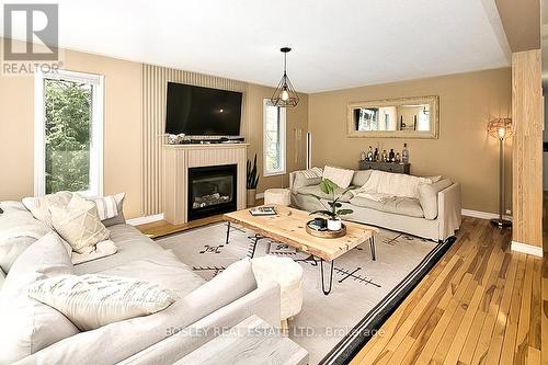 136 Maple Lane, Blue Mountains, ON - Indoor Photo Showing Living Room With Fireplace