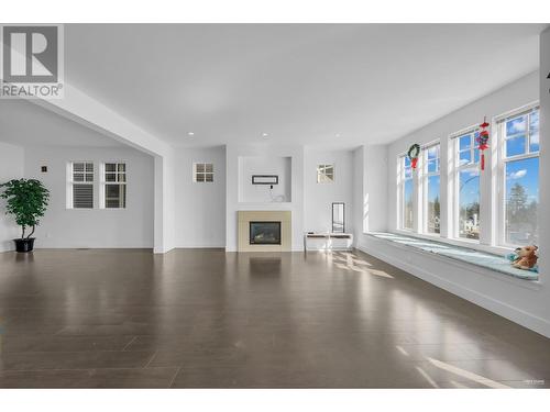 Main House 3489 David Avenue, Coquitlam, BC - Indoor Photo Showing Living Room With Fireplace