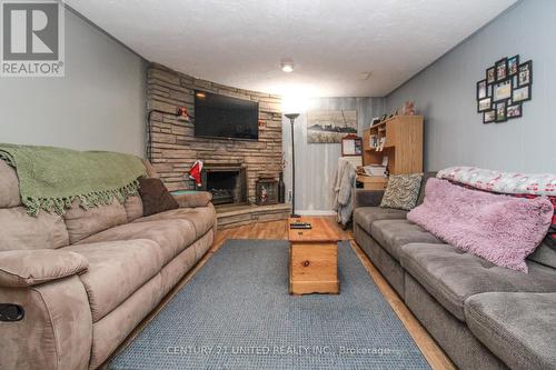 1495 Fair Avenue, Peterborough (Monaghan), ON - Indoor Photo Showing Living Room With Fireplace