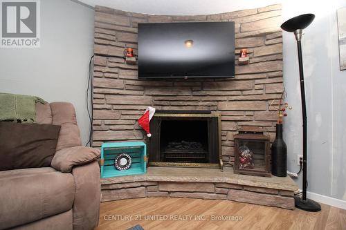 1495 Fair Avenue, Peterborough (Monaghan), ON - Indoor Photo Showing Living Room With Fireplace