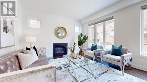 23 Snap Dragon Trail, East Gwillimbury, ON - Indoor Photo Showing Living Room With Fireplace