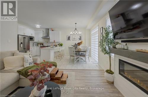 71 Dass Drive W, Centre Wellington (Fergus), ON - Indoor Photo Showing Living Room With Fireplace