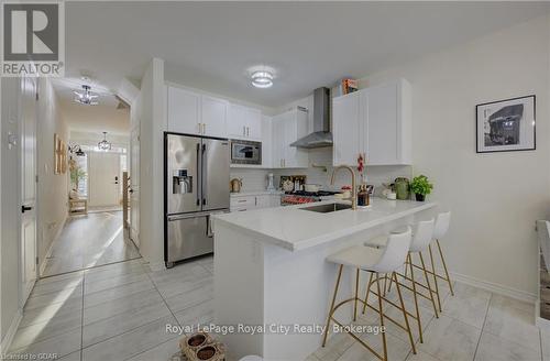 71 Dass Drive W, Centre Wellington (Fergus), ON - Indoor Photo Showing Kitchen With Stainless Steel Kitchen With Upgraded Kitchen