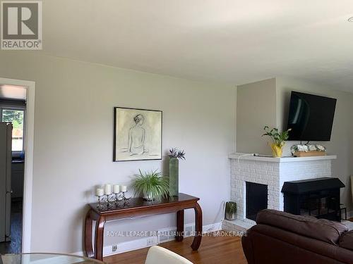 237 Dufferin Road, Drummond/North Elmsley, ON - Indoor Photo Showing Living Room With Fireplace