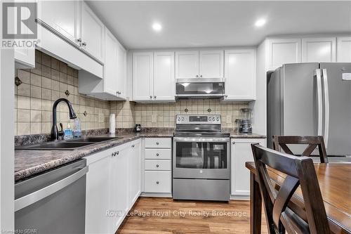 204 - 345 Fisher Mills Road, Cambridge, ON - Indoor Photo Showing Kitchen With Double Sink