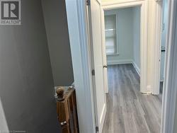 Hallway featuring light hardwood / wood-style floors - 