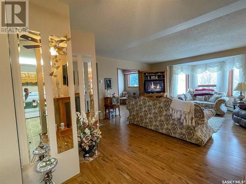 301 119 4Th Avenue W, Kindersley, SK - Indoor Photo Showing Living Room With Fireplace