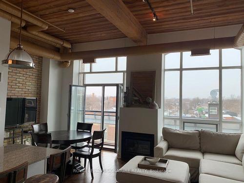 416-993 Queen St W, Toronto, ON - Indoor Photo Showing Living Room With Fireplace