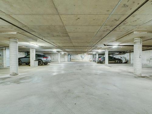 Garage - 604-65 Boul. René-Lévesque E., Montréal (Ville-Marie), QC - Indoor Photo Showing Garage