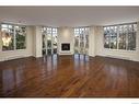 306-999 Burdett Ave, Victoria, BC  - Indoor Photo Showing Living Room With Fireplace 