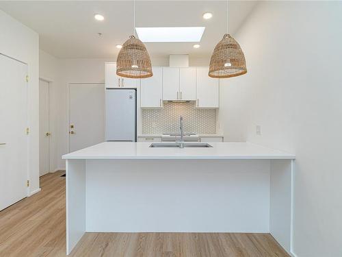 403-2348 Beacon Ave, Sidney, BC - Indoor Photo Showing Kitchen With Double Sink