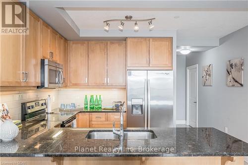 901 - 150 Wellington Street E, Guelph (Central West), ON - Indoor Photo Showing Kitchen With Double Sink With Upgraded Kitchen