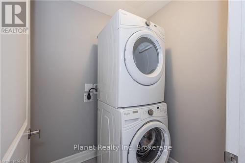 901 - 150 Wellington Street E, Guelph (Central West), ON - Indoor Photo Showing Laundry Room