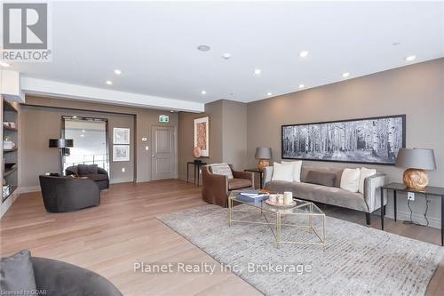 901 - 150 Wellington Street E, Guelph (Central West), ON - Indoor Photo Showing Living Room