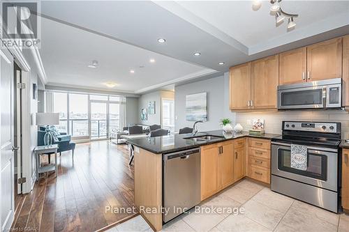 901 - 150 Wellington Street E, Guelph (Central West), ON - Indoor Photo Showing Kitchen With Double Sink