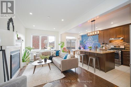 61 Edinburgh Drive, Brampton, ON - Indoor Photo Showing Living Room With Fireplace