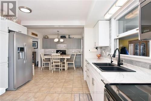 7 King Crescent, East Zorra-Tavistock (Hickson), ON - Indoor Photo Showing Kitchen With Double Sink With Upgraded Kitchen