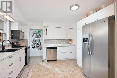 7 King Crescent, East Zorra-Tavistock (Hickson), ON - Indoor Photo Showing Kitchen With Double Sink With Upgraded Kitchen