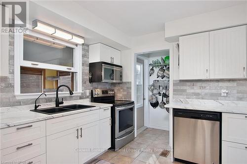 7 King Crescent, East Zorra-Tavistock (Hickson), ON - Indoor Photo Showing Kitchen With Double Sink With Upgraded Kitchen