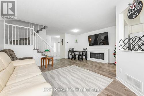 7 Foxden Place, Ottawa, ON - Indoor Photo Showing Other Room With Fireplace