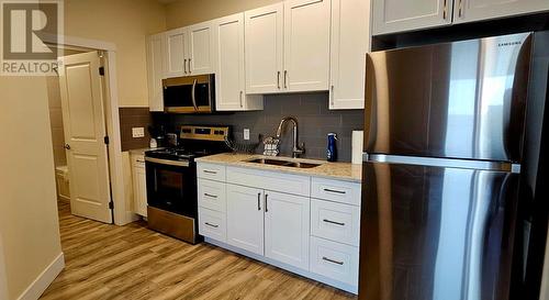 7310 Main Street Unit# 209, Osoyoos, BC - Indoor Photo Showing Kitchen With Double Sink