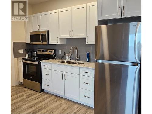 7310 Main Street Unit# 209, Osoyoos, BC - Indoor Photo Showing Kitchen With Double Sink