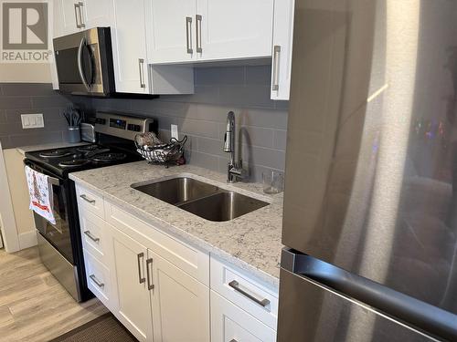 7310 Main Street Unit# 209, Osoyoos, BC - Indoor Photo Showing Kitchen With Double Sink