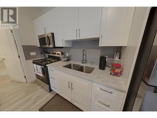 7310 Main Street Unit# 209, Osoyoos, BC - Indoor Photo Showing Kitchen With Double Sink