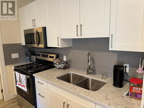 7310 Main Street Unit# 209, Osoyoos, BC - Indoor Photo Showing Kitchen With Double Sink