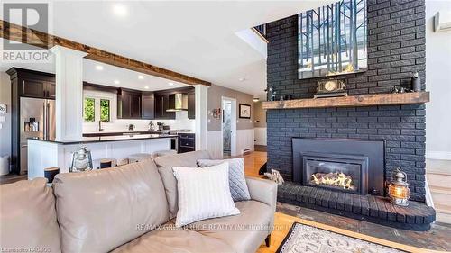 151 Grandore Street W, Georgian Bluffs, ON - Indoor Photo Showing Living Room With Fireplace