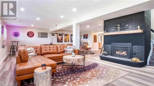 151 Grandore Street W, Georgian Bluffs, ON - Indoor Photo Showing Living Room With Fireplace