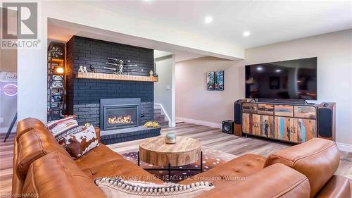 151 Grandore Street W, Georgian Bluffs, ON - Indoor Photo Showing Living Room With Fireplace