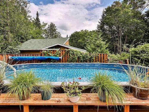 Piscine - 2118Z Mtée Des Quatre-Lacs, Saint-Adolphe-D'Howard, QC - Outdoor With Above Ground Pool