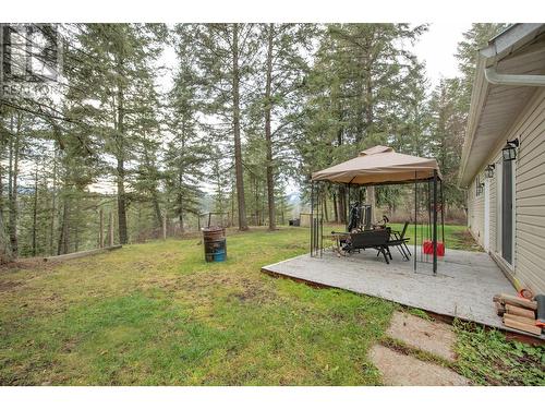 398 Albers Road, Lumby, BC - Outdoor With Deck Patio Veranda With Backyard