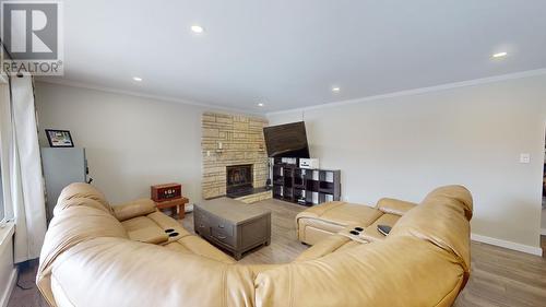 12293 Birch Avenue, Fort St. John, BC - Indoor Photo Showing Living Room With Fireplace