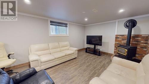 12293 Birch Avenue, Fort St. John, BC - Indoor Photo Showing Other Room With Fireplace