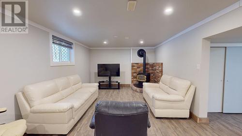 12293 Birch Avenue, Fort St. John, BC - Indoor Photo Showing Living Room With Fireplace