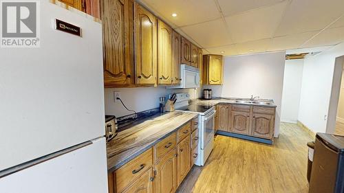 12293 Birch Avenue, Fort St. John, BC - Indoor Photo Showing Kitchen With Double Sink