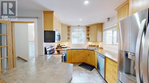 12293 Birch Avenue, Fort St. John, BC - Indoor Photo Showing Kitchen With Double Sink